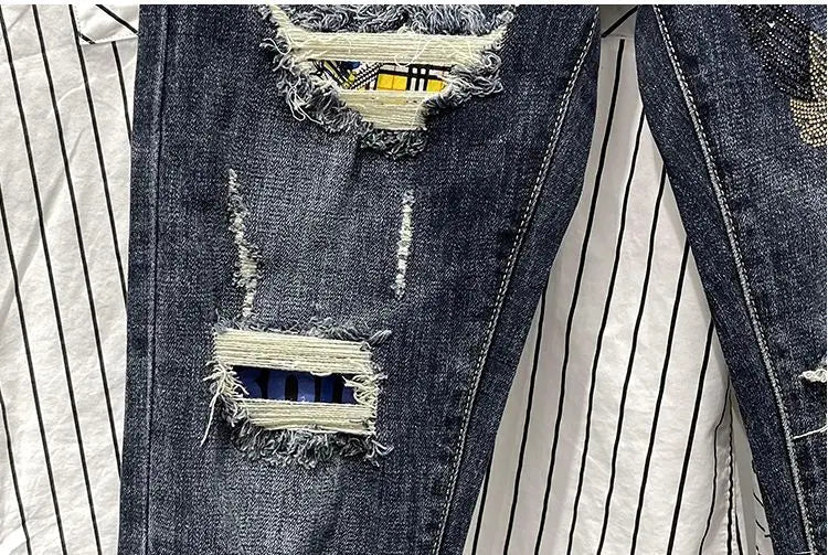 Jeans strappati strappati con stampa per uomo Pantaloni con fori grafici rotti Pantaloni casual morbidi Kpop eleganti pantaloni da cowboy da uomo larghi gotici regolari - StepByStep