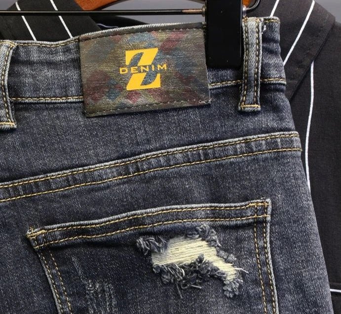 Jeans strappati strappati con stampa per uomo Pantaloni con fori grafici rotti Pantaloni casual morbidi Kpop eleganti pantaloni da cowboy da uomo larghi gotici regolari - StepByStep