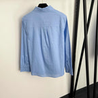 Camicia di lino a maniche lunghe versatile in tinta unita con ricamo semplice