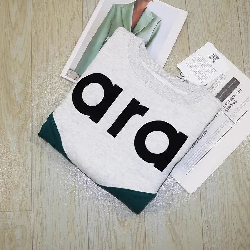 Felpa in jersey di cotone bicolore floccata nera da donna girocollo manica lunga autunno inverno felpa femminile nuova