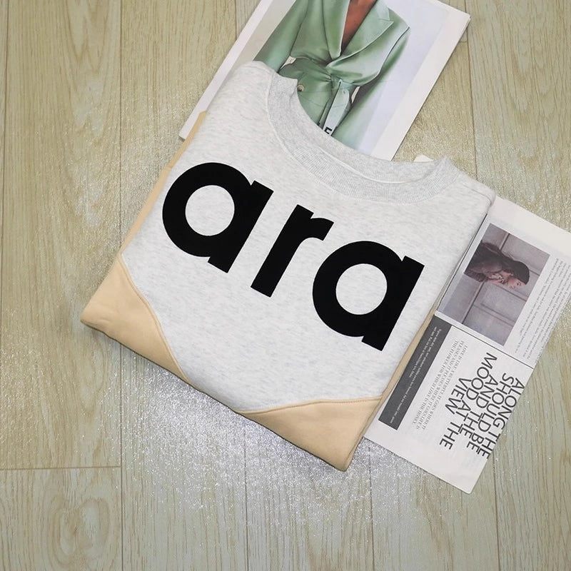 Felpa in jersey di cotone bicolore floccata nera da donna girocollo manica lunga autunno inverno felpa femminile nuova