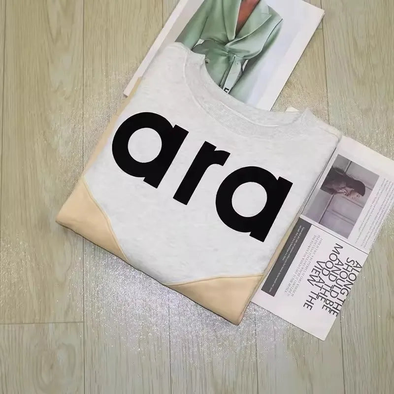 Felpa in jersey di cotone bicolore floccata nera da donna girocollo manica lunga autunno inverno felpa femminile nuova