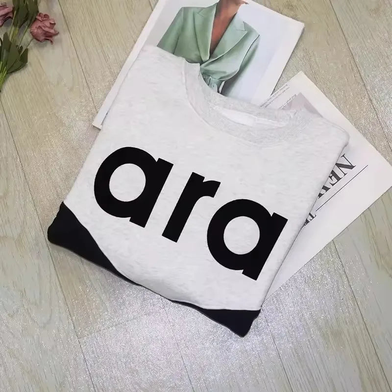 Felpa in jersey di cotone bicolore floccata nera da donna girocollo manica lunga autunno inverno felpa femminile nuova