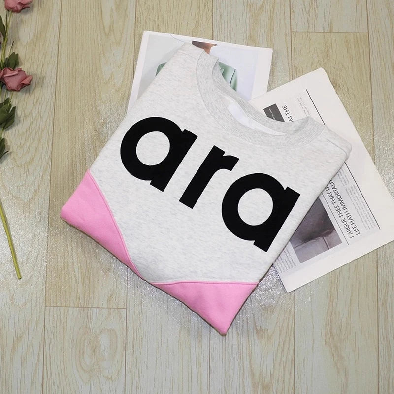 Felpa in jersey di cotone bicolore floccata nera da donna girocollo manica lunga autunno inverno felpa femminile nuova