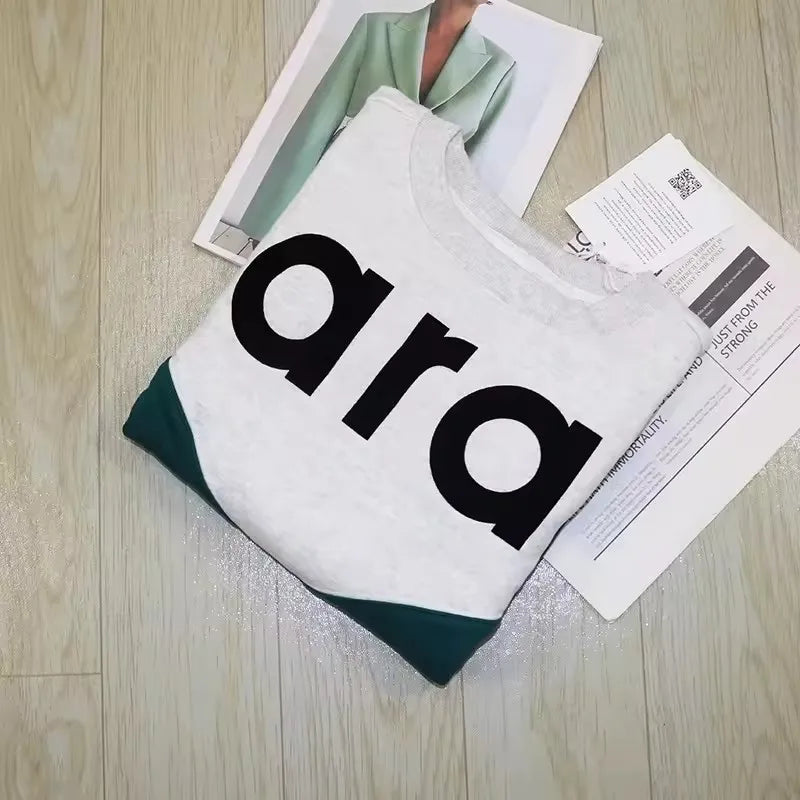 Felpa in jersey di cotone bicolore floccata nera da donna girocollo manica lunga autunno inverno felpa femminile nuova