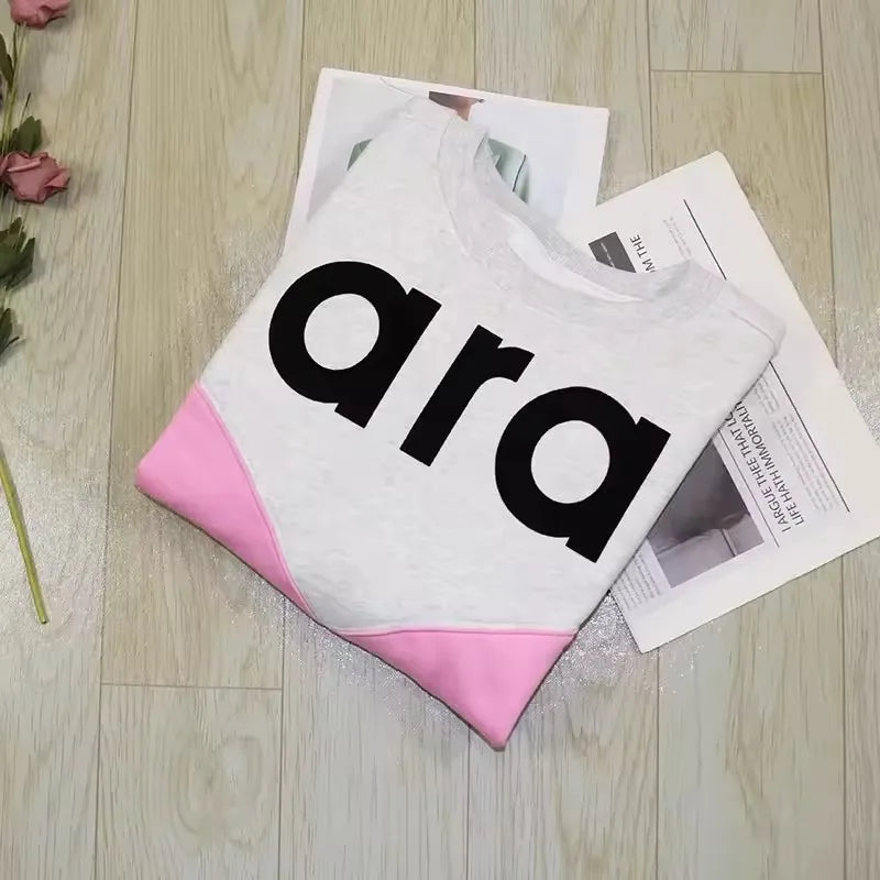 Felpa in jersey di cotone bicolore floccata nera da donna girocollo manica lunga autunno inverno felpa femminile nuova