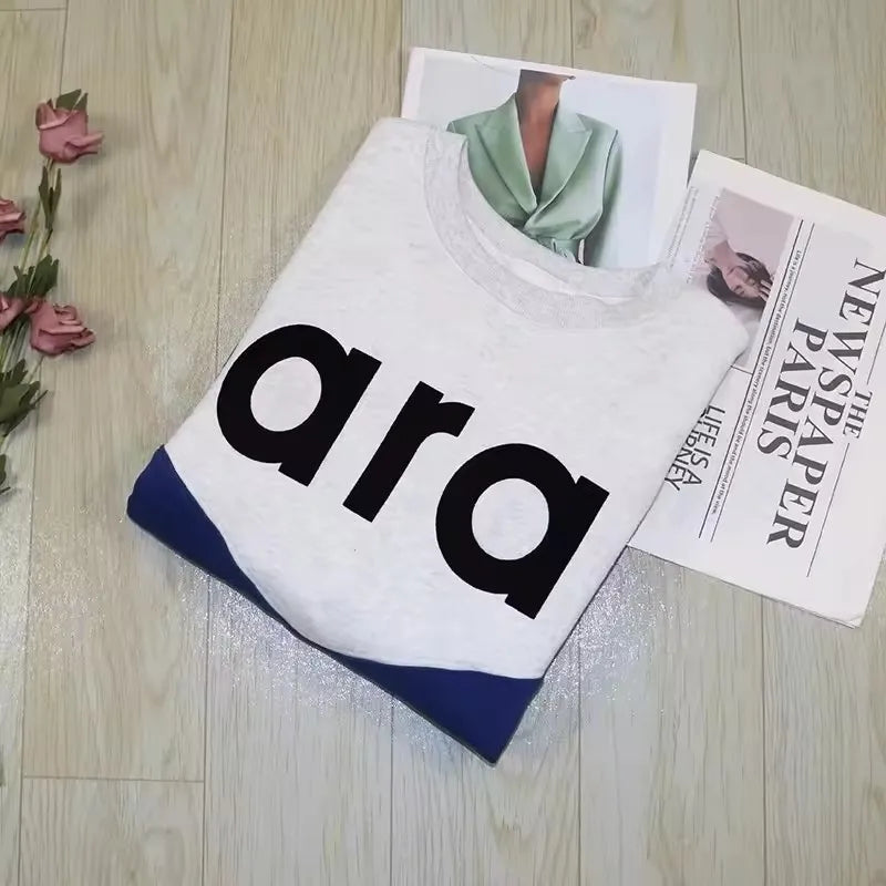 Felpa in jersey di cotone bicolore floccata nera da donna girocollo manica lunga autunno inverno felpa femminile nuova