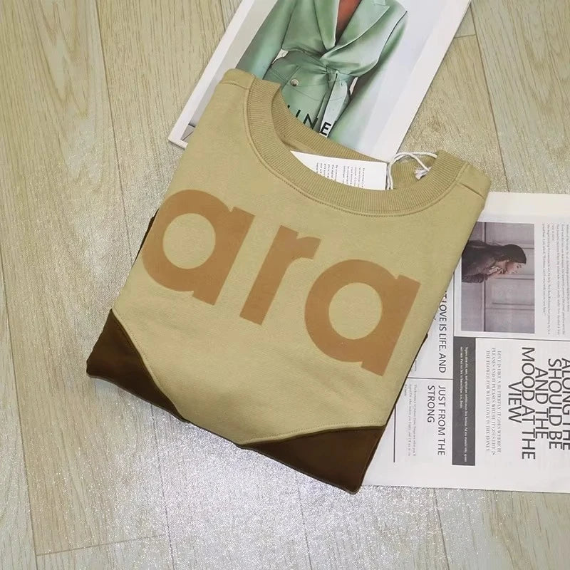 Felpa in jersey di cotone bicolore floccata nera da donna girocollo manica lunga autunno inverno felpa femminile nuova