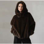 Cappotto da donna in pelliccia sintetica con cappuccio - StepByStepNow