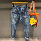 Jeans da uomodi High Street Distressed Graffiti Patch - StepByStepNow