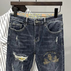 Jeans strappati strappati con stampa per uomo Pantaloni con fori grafici rotti Pantaloni casual morbidi Kpop eleganti pantaloni da cowboy da uomo larghi gotici regolari - StepByStep