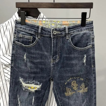 Jeans strappati strappati con stampa per uomo Pantaloni con fori grafici rotti Pantaloni casual morbidi Kpop eleganti pantaloni da cowboy da uomo larghi gotici regolari - StepByStep