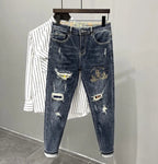 Jeans strappati strappati con stampa per uomo Pantaloni con fori grafici rotti Pantaloni casual morbidi Kpop eleganti pantaloni da cowboy da uomo larghi gotici regolari - StepByStep