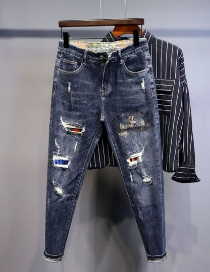 Jeans strappati strappati con stampa per uomo Pantaloni con fori grafici rotti Pantaloni casual morbidi Kpop eleganti pantaloni da cowboy da uomo larghi gotici regolari - StepByStep