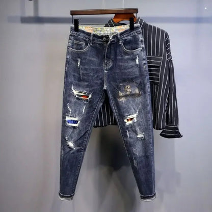 Jeans strappati strappati con stampa per uomo Pantaloni con fori grafici rotti Pantaloni casual morbidi Kpop eleganti pantaloni da cowboy da uomo larghi gotici regolari - StepByStep
